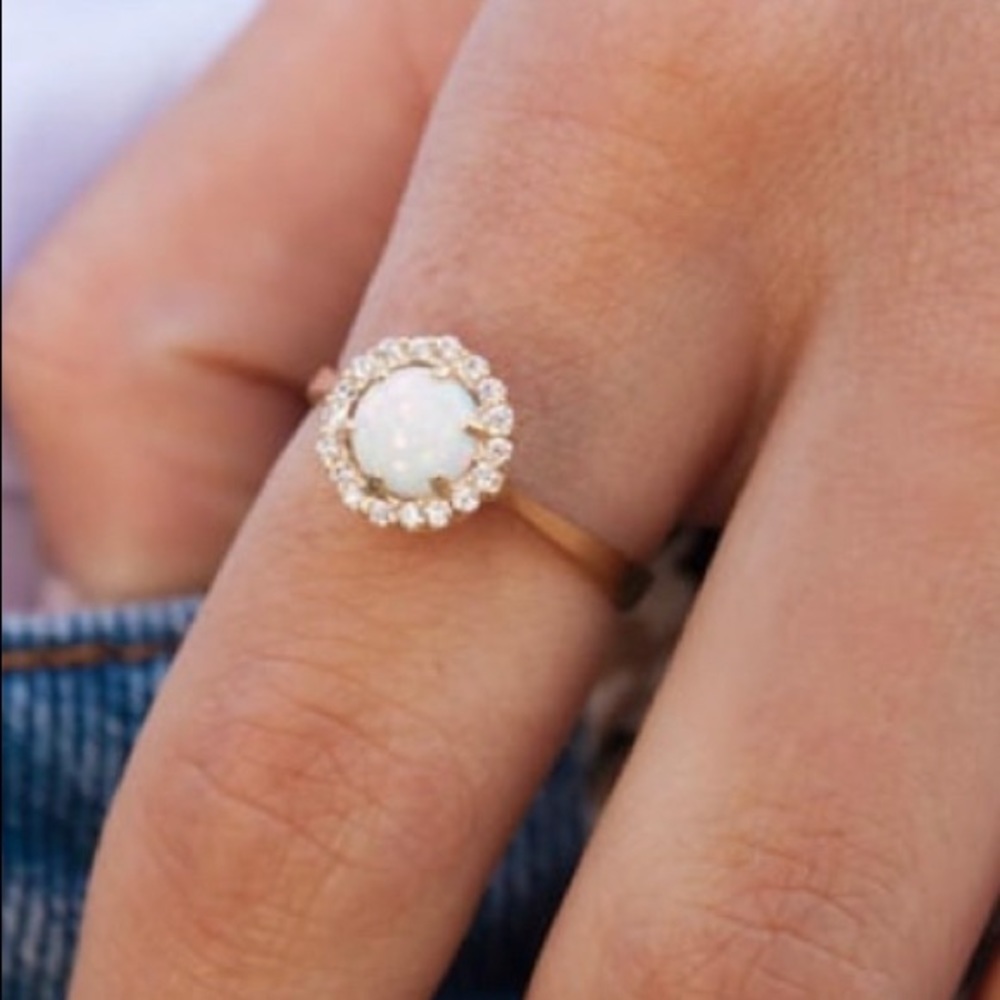 14k yellow gold opal and diamond ring. Missing one stone.